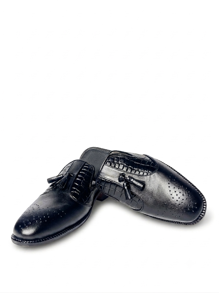 ⁠RENARD NOIR handcrafted black croc embossed brogue tassel mules pair view⁠  